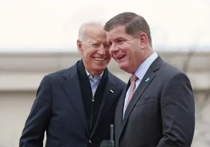  ?? ANGELA ROWLINGS / BOSTON HERALD ?? OLD FRIENDS: Former Vice President Joe Biden and Mayor Martin Walsh laugh together during a rally for striking workers outside the South Bay Stop & Shop in 2019. Walsh is now leading an economic discussion for Biden in New Hamsphire.