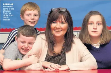  ??  ?? POPULAR Eileen with some of the children from her Little Stars club in Wishaw