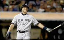  ?? AP Photo ?? In this June 11, 2013, photo, New York Yankees’ Mark Teixeira reacts after taking a strike from Oakland Athletics’ Jerry Blevins in the eighth inning of a baseball game in Oakland, Calif. hevin Youkilis needs back surgery and Teixeira returned to the...