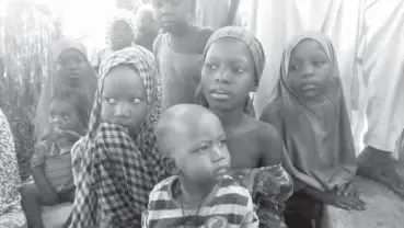  ??  ?? Amsatu and her siblings are part of the army of orphans