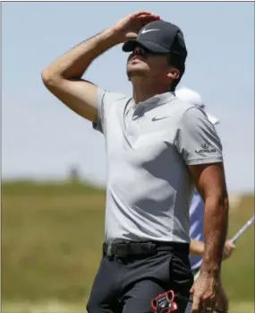  ?? CHRIS CARLSON - THE ASSOCIATED PRESS ?? Jason Day reacts on the ninth hole during the second round of the U.S. Open Friday at Erin Hills in Erin, Wis.