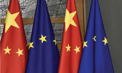  ??  ?? The Chinese and EU flags on display before a summit in Brussels. Photograph: John Thys/AP