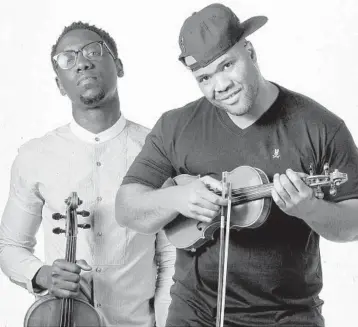  ??  ?? Former Dillard classmates Wil B., left, andKevMarc­us just released a Black Violin holiday album titled“GiveThanks.” BLACKVIOLI­N