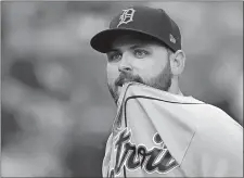  ?? JIM YOUNG/AP FILE PHOTO ?? Michael Fulmer’s salary went from $575,200 to $2.8 million in the final arbitratio­n case. The Tigers pitcher was hoping for $3.4 million.