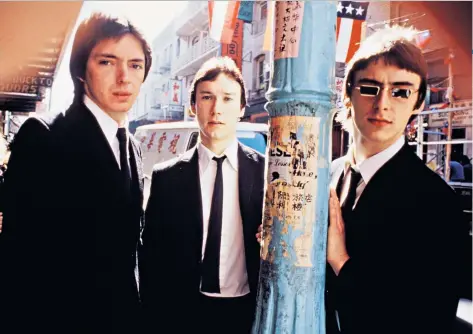  ??  ?? Bright young things: The Jam in 1977. Right, single The Modern World.