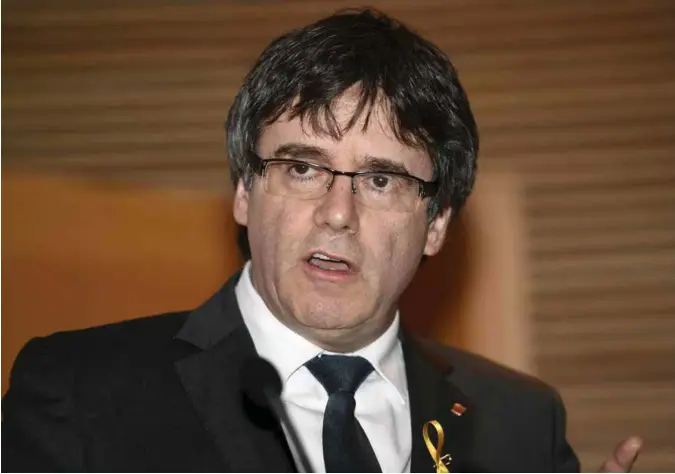  ?? MARTTI KAINULAINE­N / AP /NTB SCANPIX ?? Carles Puigdemont ble pågrepet av tysk politi ved grensen til Danmark i går. Den avsatte katalanske regionalpr­esidenten risikerer 30 års fengsel etter å ha blitt tiltalt for opprør.