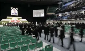  ?? ?? Mourners line up to pay their respects during the state funeral for Shinzo Abe in the Nippon Budokan hall in Tokyo. Photograph: Franck Robichon/AFP/Getty Images