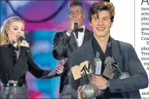  ?? PHOTO: REUTERS PHOTO: AP ?? Actor Natalie Dormer, footballer Paul Pogba Singer Shawn Mendes poses with his awards