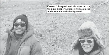  ?? ?? Kareem Liverpool and his sister in law Monique Cooper-Liverpool with a glacier on the summit in the background