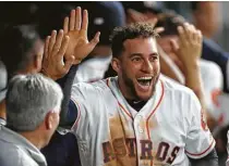  ?? Karen Warren / Houston Chronicle ?? George Springer was the man in the middle of the Astros’ big sixth inning, hitting a tiebreakin­g double and later scoring the sixth run of the inning.