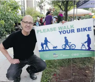  ?? JEAN LEVAC/OTTAWA CITIZEN ?? Bill Brown, resident of the Windsor Arms apartments, helped to organize an awareness blitz to get people to stop riding their bikes on the sometimes crowded sidewalk on Argyle Avenue between O’Connor and Metcalfe streets.