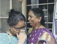  ??  ?? Victims’ relatives wait for news at a hospital