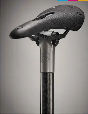  ??  ?? SEAT MAST TOPPER Using internal spacers, the seat mast topper can adjust saddle height by up to 3cm. The topper also conceals the Di2 junction box, which is held in place by an ingenious bracket.