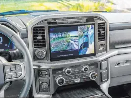  ??  ?? The 12-inch center screen utilizes high-resolution cameras to provide multiple views including a 360-degree overhead view to make maneuverin­g in tight spaces easy.