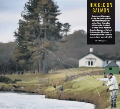  ?? PICTURE: GETTY. ?? Anglers cast their rods during the opening of the salmon fishing season on the River Helmsdale in Helmsdale, Scotland. The river, which has been described as one of the best in the north of Scotland, is one of the earliest rivers to open to fishermen in the UK.