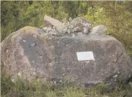  ?? Photo / File ?? The Monica Cantwell memorial rock at Mauao summit.