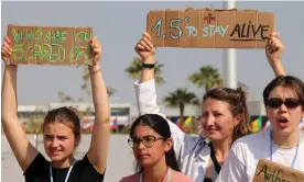  ?? Photograph: Fayez Nureldine/AFP/Getty Images ?? Climate protesters in Egypt remind delegates of the 1.5C target but China and India want to emphasise the Paris agreement that had an upper limit of a 2C rise.