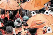  ?? David Maialetti / Associated Press ?? A man in blackface is seen marching with the Froggy Carr club in Philadelph­ia’s Mummers Parade.