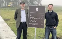  ??  ?? Boost Brendan Dick, director of BT Scotland, with MP Luke Graham at the new 4G mast on the Langside