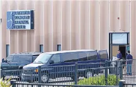  ?? DEAN HANSON/ JOURNAL ?? FBI agents remove boxes from Southwest Secondary Learning Center charter schools in 2014. Founder Scott Glasrud was sentenced last month to five years in federal prison for defrauding those schools out of millions of dollars over nearly 15 years.