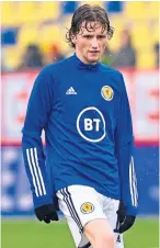  ?? ?? Alex Lowry on duty with Scotland’s Under-21s in Belgium back in June
