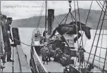  ??  ?? This striking image shows a pony being hoisted onto a steamer at Lochmaddy.