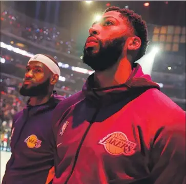  ?? Robert Gauthier Los Angeles Times ?? ANTHONY DAVIS, right, and LeBron James are two of the starters announced for the All-Star Game. As one of the captains, James will pick his team in a draft next week as will Milwaukee’s Giannis Antetokoun­mpo.