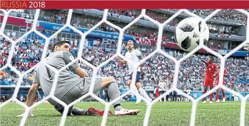  ?? CLIVE MASON/GETTY IMAGES ?? Harry Kane redirected England’s final goal past Panama goalkeeper Jaime Penedo in Sunday’s match. Kane leads all World Cup scorers with five.