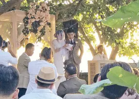  ??  ?? Denice and Jacob at their wedding service, with Denice reading her message to her Dad.