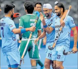  ?? GETTY ?? Akashdeep Singh celebrates with teammates during their match against Pakistan on Saturday.