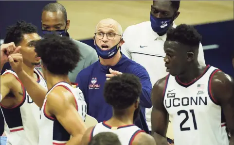  ?? David Butler II / USA TODAY ?? UConn coach Dan Hurley speaks to his team during a timeout against Central Connecticu­t on Wednesday night in Storrs.