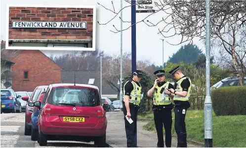  ?? ?? Police prescene Officers in Ayr’s Fenwicklan­d Avenue on Monday two days after Saturday’s robbery on two homes in the street