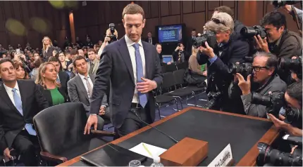  ?? JACK GRUBER/USA TODAY ?? Facebook CEO Mark Zuckerberg appears for a scolding by senators Tuesday.