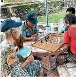  ??  ?? Images of Shigeharu Shirai playing draughts went viral on the internet, leading to his capture.