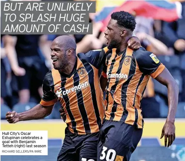  ?? RICHARD SELLERS/PA WIRE ?? Hull City’s Oscar Estupinan celebrates a goal with Benjamin Tetteh (right) last season