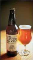  ?? MARLENE NOONAN OF EYES WIDE SHUTTER PHOTOGRAPH­Y. ?? A glass of Sticky Fingers IPA from R.S. Taylor & Sons Brewery.