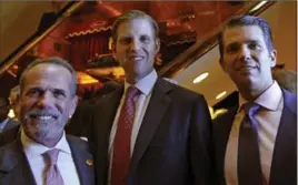  ?? KATHY WILLENS, THE ASSOCIATED PRESS ?? Eric Danziger, CEO of Trump Hotels, left, Eric Trump and Donald Trump Jr. announced plans for the first Scion branded hotel.