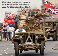  ??  ?? Historical re-enactors dress up in WWII uniforms and drive a Jeep for Liberation Day, 2019