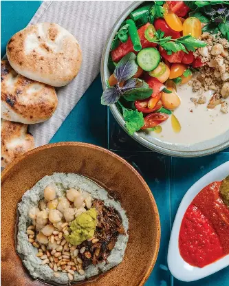  ?? (Itamar Ginzburg) ?? ISRAELI SALAD, a common staple with similar dishes throughout the Mediterran­ean region.