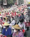  ??  ?? The Tustins’ friend protests against the Myanmar military coup, in Mandalay, in recent days.