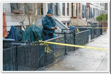  ?? THEODORE PARISIENNE FOR NYDN ?? Crime scene (both photos) outside basement on Sterling Place in Crown Heights where 40-year-old Lavel Fraiser was fatally shot in the torso early Sunday.