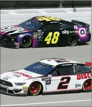  ?? PAUL SANCYA — THE ASSOCIATED PRESS ?? Brad Keselowski (2) and Jimmie Johnson (48) practice for a NASCAR Cup Series auto race at Michigan Internatio­nal Speedway in Brooklyn, Mich., Saturday.