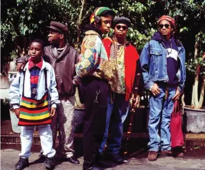  ??  ?? On Point, Phife, All the Time
Clockwise from left: Phife with his mother, poet
Cheryl Boyce-Taylor, at a movie premiere in 2011; Phife (second from left) and A Tribe Called Quest on a 1990 episode of Yo! MTV Raps; with wife Deisha Head-Taylor around the time of
their engagement in 2001.