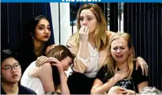  ?? AP/PTI ?? THE AGONY Clinton supporters react to election results at Jacob Javits Center glass enclosed lobby in New York on Tuesday