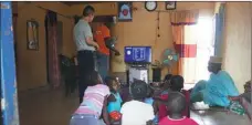  ?? TO CHINA DAILY PROVIDED ?? A worker from StarTimes installs a satellite TV at a village in Nigeria.