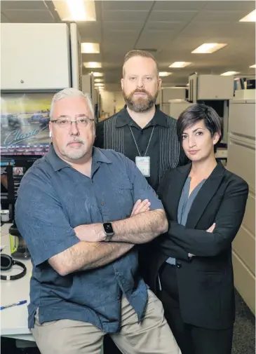  ?? MATIAS J. OCNER mocner@miamiheral­d.com ?? From left, Miami-Dade Police Maj. George Perera, Lt. Jordan Fried and Sgt. Bridget Doyle of the South Florida Cyber Crimes Task Force at their office.