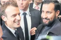  ?? LUDOVIC MARIN/AFP/GETTY IMAGES ?? French President Emmanuel Macron has come under fire for his silence regarding close security aide Alexandre Benalla, right.