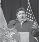  ?? TYLER LARIVIERE/AP ?? Illinois Gov. J.B. Pritzker delivers a coronaviru­s news conference April 17. Data shows previously undisclose­d outbreaks.