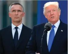  ??  ?? Above: US President Donald Trump speaks next to Nato Secretary General Jens Stoltenber­g; right: the pair with leaders including German Chancellor Angela Merkel, UK Prime Minister Theresa May and Turkey’s President Recep Tayyip Erdogan at the Nato...
