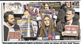  ??  ?? Pro-park and animal rights activists unite on steps of City Hall Thursday to denounce Mayor de Blasio’s plan for stables in Central Park.